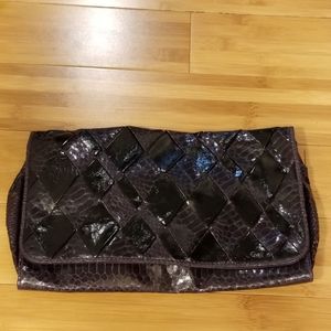 Purple clutch snake skin print purse